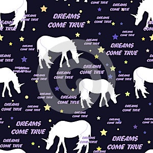 Unicorns seamless pattern with stars. Vector illustration. Dreams come true text. Background for textile, bedding, wallpapers, pos