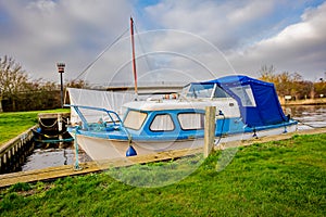 Unidentifiable boat moored up on the River Yare, Norfolk Broads, Acle