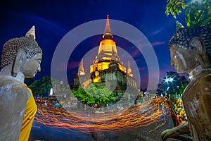 Unidentified Buddhists making candle light procession