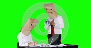 Unidentified businessman scolding his worker on desk