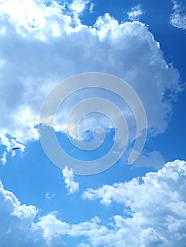 Unidentified flying object in frame cloudskape atmosphete