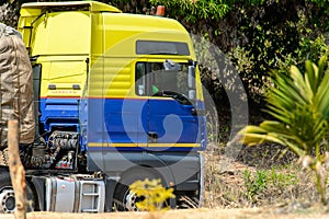 Unidentified Ghanaian man drives a truck.