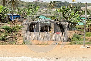 Unidentified Ghanaian people in summer house in local village.