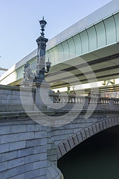People visit Nihonbashi bridge in Tokyo Japan. photo