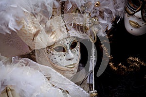 Unidentified person with Venetian Carnival mask in Venice, Italy on February