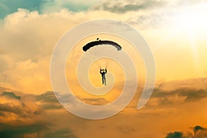 Unidentified skydiver, parachutist on sky
