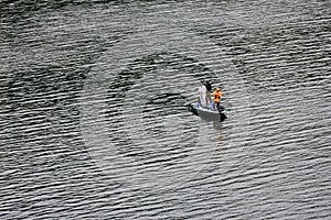 Unidentified three men are fishing