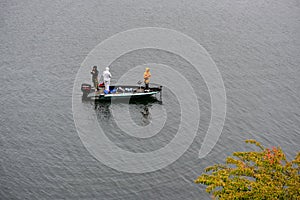 Unidentified three men are fishing