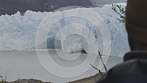 Unidentified Tourist Admiring the Majestic Perito Moreno Glacier