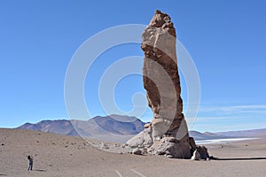 Unidentified tourist at the Piedra del Indio - Indian Rock - in Atacama desert photo