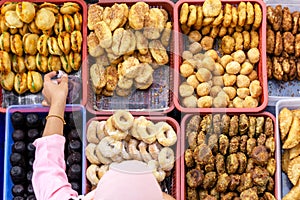 Unidentified vendor and customer at the food stall in Kota Kinabalu city food market