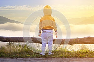 Unidentified young children standing at view point