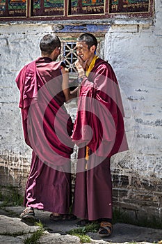 Unidentified Young Tibetan monks in the courtyard of Mindroling Monastery - Zhanang County, Shannan Prefecture, Tibet