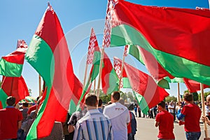 Unidentified Youth From Patriotic Party Brsm Holds Flags On The Celebration Of Victory Day.