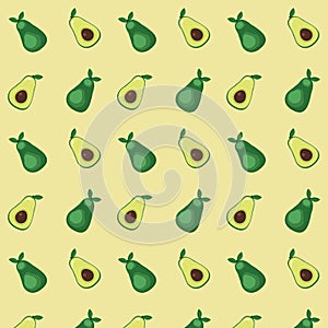 Uniform pattern of two avocado halves on a yellow background