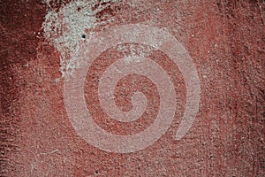 Uniform texture of the wall covered with red plaster