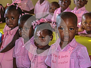 Uniformed in pink kindergartners in rural Haiti.
