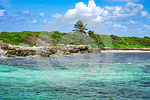Uninhabited island in the caribbean and atlantic ocean on the border
