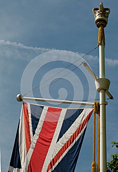 Union Jack British flag photographed blowing in the breeze on The Mall at the Trooping the Colour ceremony, London UK