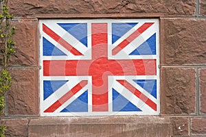 Union Jack flag painted on wall.