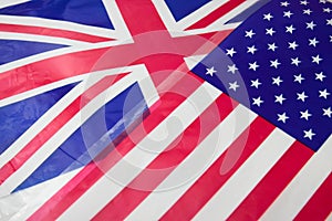 The Union Jack of the United Kingdom and the American flag with the stars and stripes