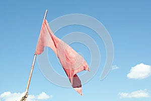 The Union of Soviet Socialist Republics flag waving on blue background