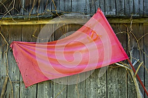 The Union of Soviet Socialist Republics flag waving on a wooden background