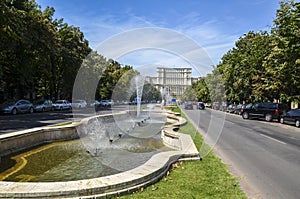 Union Square Fountain and house of the people or Parliament Palace In downtown Bucharest, Romania