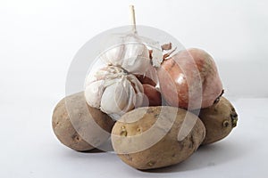 Unions, garlic and potatoes photo