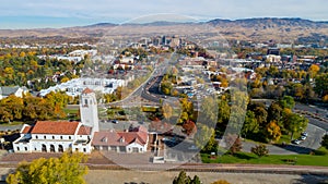 Unique aerial view of Boise with a train depot foreground
