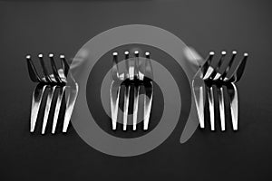 Unique arrangement of silver forks.