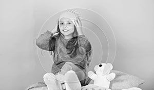 Unique attachments to stuffed animals. Teddy bears improve psychological wellbeing. Child small girl playful hold teddy