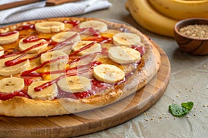 Unique banana pizza with golden crust