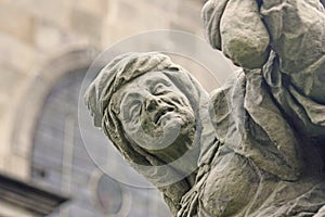 Unique baroque statue depicting avarice photo