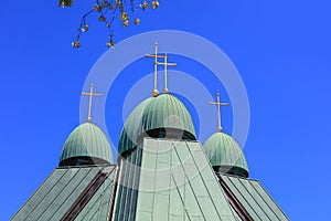 Unique Church dome with golden crosses in Toronto, Canada