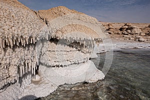 Unique coastline, natural salt formations and patterns, salt stalagmites in the Dead Sea shore.