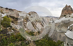 Unique colorful sandstone rock formations in the Rose Valley. Cappadocia, Turkey