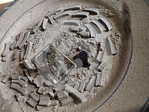 a unique concept that shows mosquito coil dregs scattered on a plate