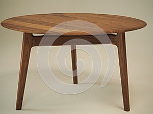 Unique design table with round top made of natural wood