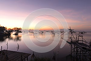 Unique dip fishing net at sunrise, Phatthalung