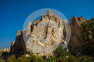 Unique geological formations in Cappadocia, Central Anatolia, Turkey. Cappadocian Region with its valley, canyon, hills located