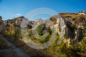 Unique geological formations in Cappadocia, Central Anatolia, Turkey. Cappadocian Region with its valley, canyon, hills located