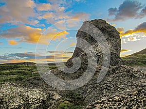 Unique geological formations columnar basalt and basalt rosettes at Vesturdalur, Asbyrgi, with dramatic sky in the sunset, Northea