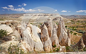 Unique geological rock formations Fairy Chimneys in Cappadocia. Popular touristic area in Turkey