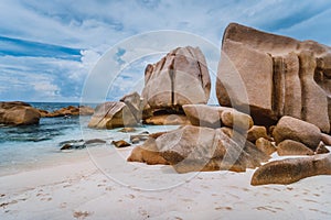 Unique granite rocks at remote Anse Marron beach in La Digue island, Seycheles islands photo