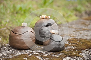 Closeup of unique handmade three pots