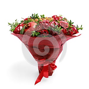 Unique homemade edible bouquet consisting of red fruits and flowers isolated on white background