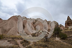 Unique limestone pyramids with rock formations in Cappadocia, Goreme, Turkey