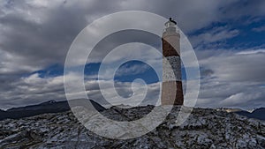 A unique old lighthouse on the edge of the world. photo