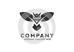 Unique owl with leaves wings logo